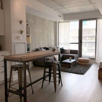 Stylish 1 Bed, 1 Bath with City Views and High Ceilings plus Balcony - Photo 4