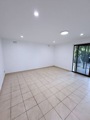 Renovated Spacious 2B2B on House whole level Bills included - Photo 1