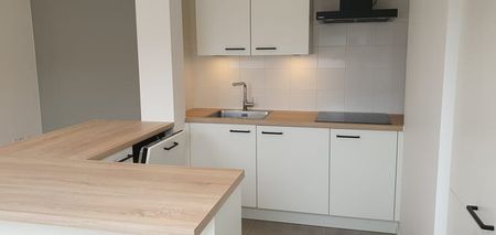 Appartement te huur - foto 2