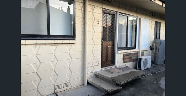 Low-Maintenance 2-Bedroom Unit in a Convenient Location - Photo 1