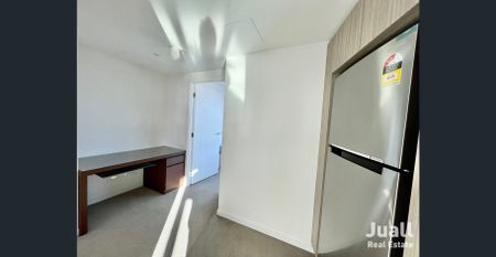 Fully Furnished 2-Bedroom Haven with Stunning Water and City Views - Photo 2