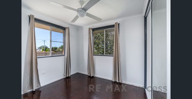 Comfortable & Easy-Care Unit in Handy Wilsonton Location - Photo 1