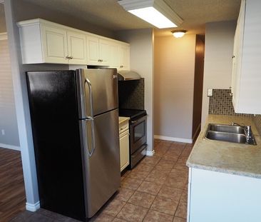 2 Bedroom Condo! In-Suite Laundry! Storage! - Photo 6
