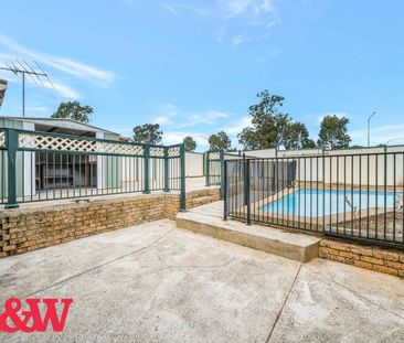 LARGE HOME WITH A POOL !! - Photo 2