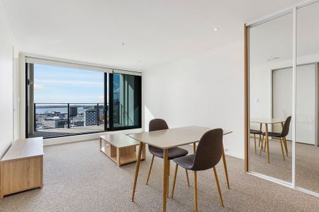 Penthouse level apartment with secure carpark - Photo 2