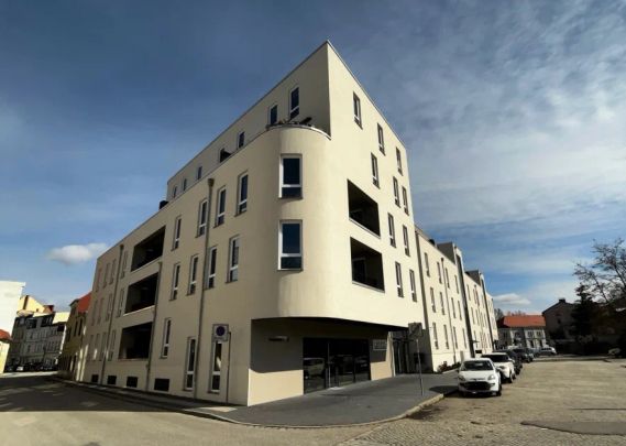 Moderne 2-Zimmer-Wohnung mit Balkon und Tiefgaragenstellplatz im Herzen der Stadt zu vermieten - Foto 1