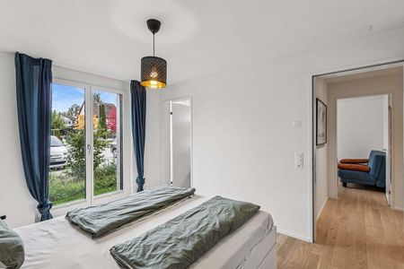 Moderne und lichtdurchflutete 4.5-Zimmer-Wohnung mit Gartenfläche - Photo 4