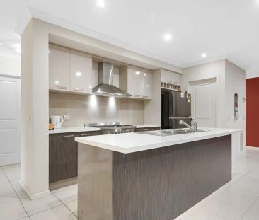 Beautifully Designed Home with Effortless Upkeep - Photo 6