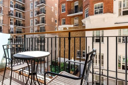 A 2 double bedroom, 2 bathroom apartment in a prime SW1 portered development which is presented in excellent condition throughout. - Photo 3