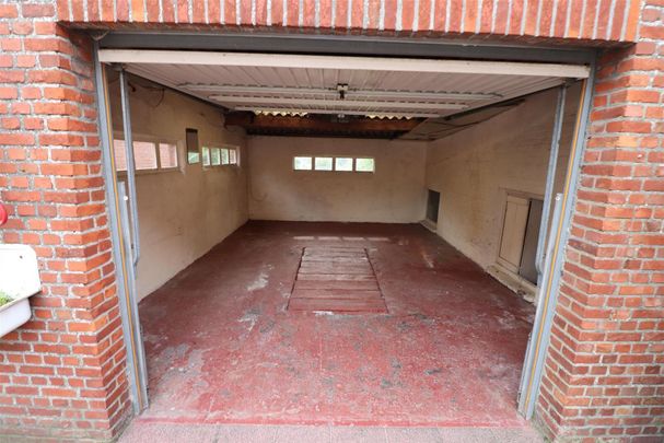 Een ruim woonhuis - halfopen bebouwing - met garage en tuin. - Photo 1