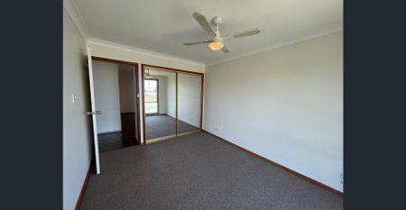 4-Bedroom Home with Double Carport - Photo 4