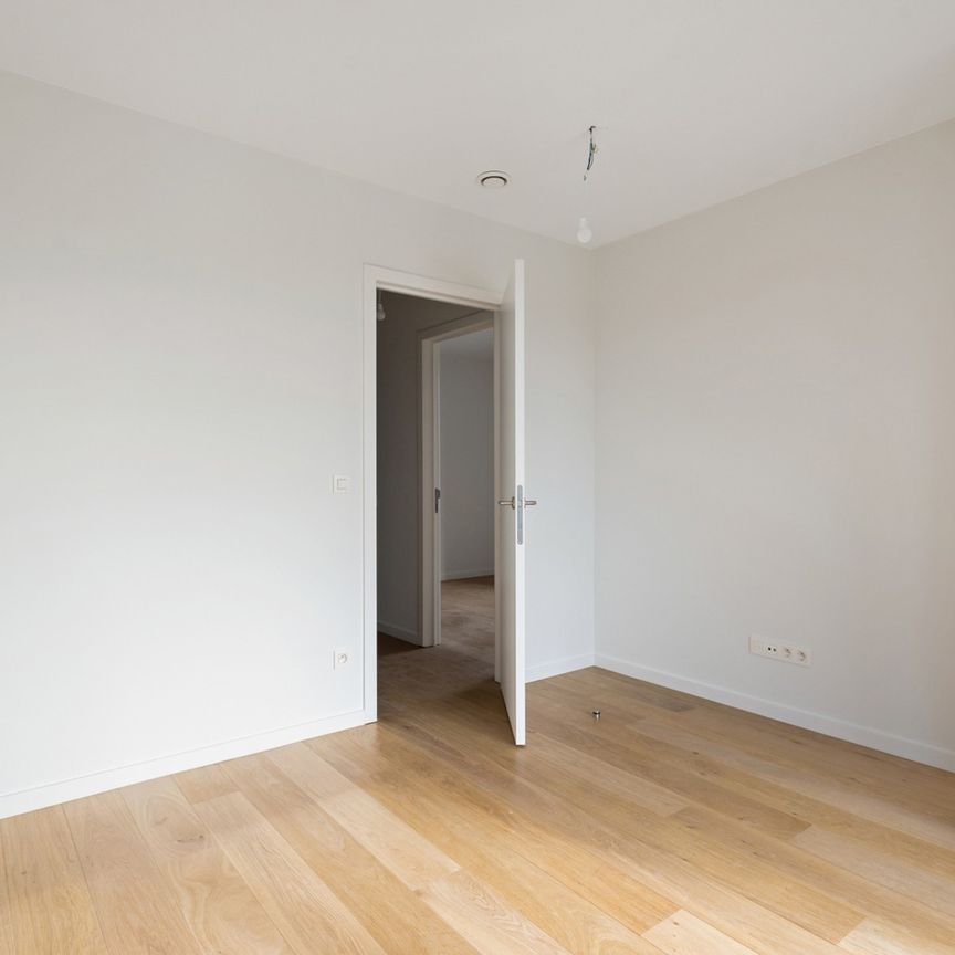 Nieuwbouwappartement met 2 slpk. + dressing/bureau en lift - Photo 1