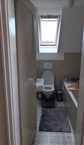 Charming 3.5-room attic apartment in a historic building - Foto 5