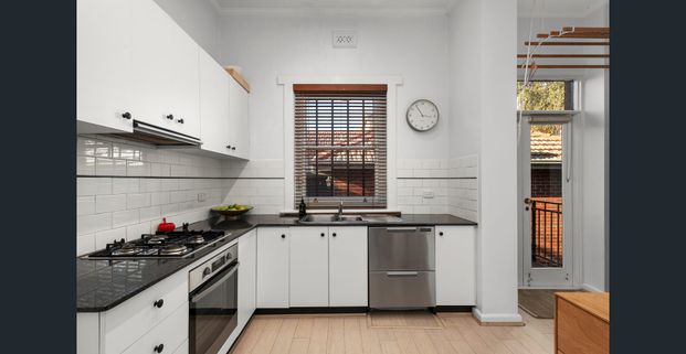 Delightful Deco with Two Living Zones & Balcony - Photo 1