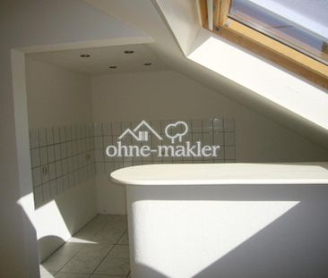 Helle 3-Zi Dachgeschosswohnung mit Garage und Grünflächennutzung in... - Photo 4