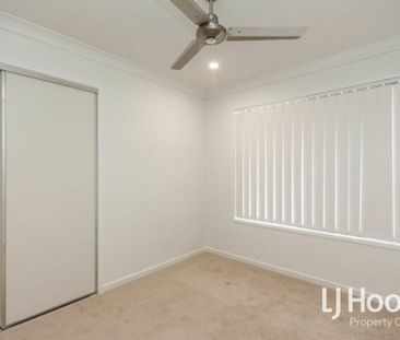 Modern Family Home with Stylish Finishes & Low-Maintenance Living - Photo 4