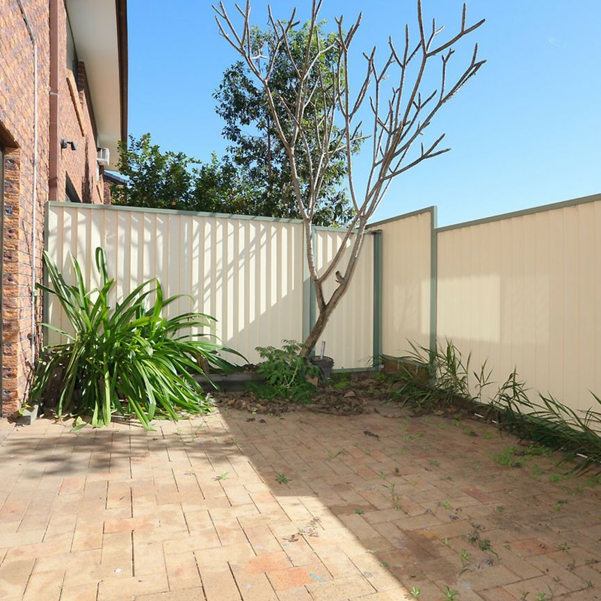 CENTRALLY LOCATED TOWNHOUSE - Photo 1