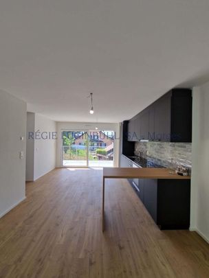 Beautiful 3.5 room apartment of approx. 87m2 located on the 1st floor of a new building - Photo 1