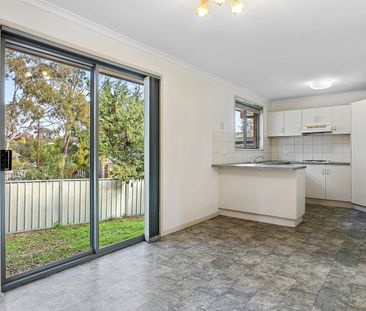 Low Maintenance Living in a Convenient Flora Hill Location - Photo 3