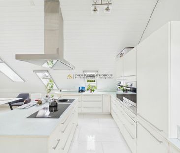 Exklusive 5.5-Zimmer-Dachwohnung mit Panoramaausblick und hochwertigem Innenausbau - Photo 3