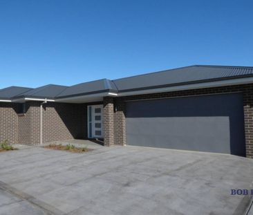 Tucked-Away Modern 3-Bedroom Home in Southlakes Estate - Photo 4