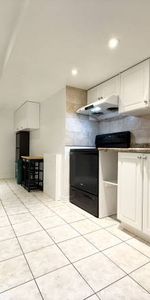 Basement One Bedroom Apartment with parking - Photo 3