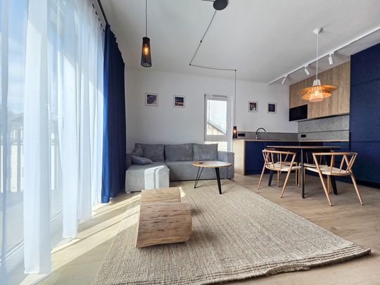 Nowoczesny salon z antresolą osiedle Storia Gdańsk - Photo 1