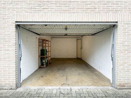 Centraal gelegen appartement met drie slaapkamers en garage - Photo 4