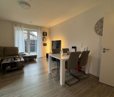 Gemütliche Erdgeschosswohnung mit Terrasse und großem Garten zu sof... - Foto 1