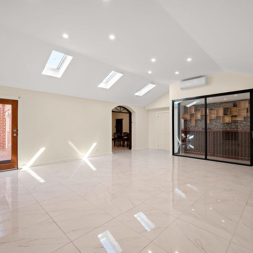 Timeless Tudor Elegance with Modern Luxury - Photo 1