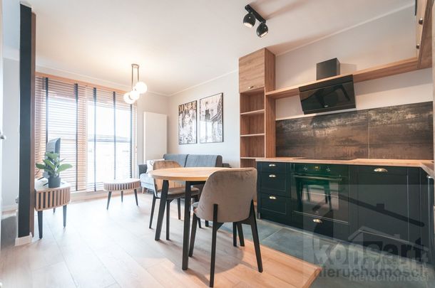 piękna kawalerka w nowym budynku w centrum - Zdjęcie 1