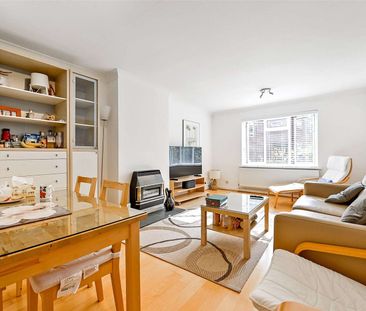 A well presented, refurbished, ground floor apartment with garage a... - Photo 3