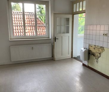 Schöne Erdgeschosswohnung in denkmalgeschütztem Haus! - Photo 3