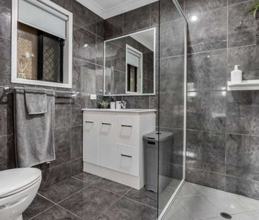 MODERN FAMILY HOME IN QUIET CULDESAC WITH 4 BEDROOMS AND 2 LIVING A... - Photo 5