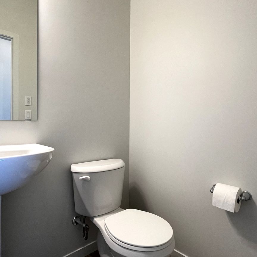 Modern 3 Bed Main Floor With In Suite Laundry - Photo 1