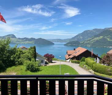 Charmantes 6.5-Zimmer-Doppelhaus in Emmetten mit traumhaftem See- und Bergblick - Photo 1
