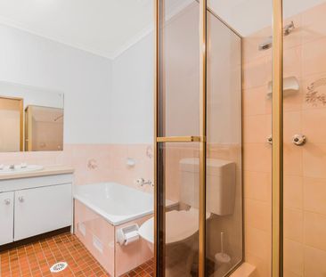Stylish two bedroom- Walk to city bus! - Photo 3