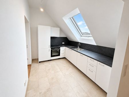 Hochwertiger Dachgeschoss-Erstbezug mit Balkon - Foto 3