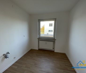 Familienfreundliche 3-Zimmer-Wohnung mit Garage und Gartenmitbenutzung - Photo 2