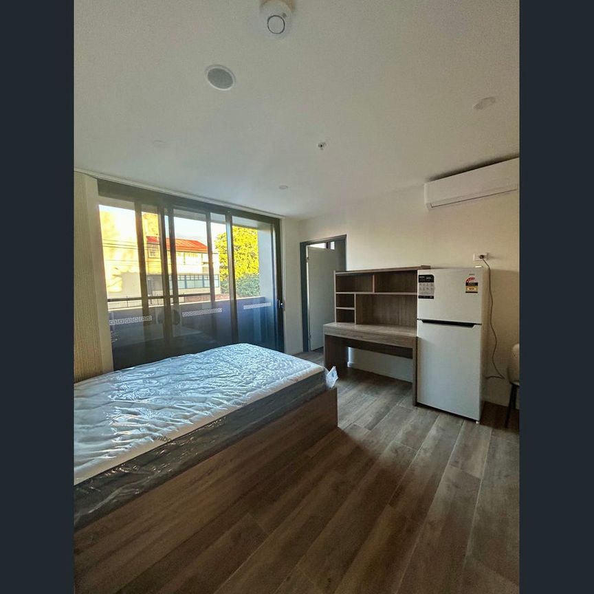 Brand New Fully furnished Studio -Light Rail at door - Photo 1