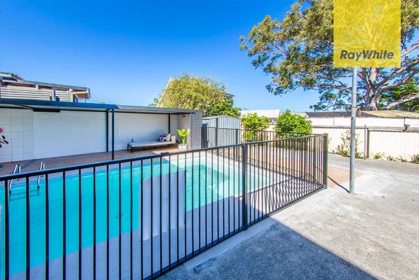 Stunningly Renovated 5-Bedroom Family Oasis with Pool and Garage! - Photo 1