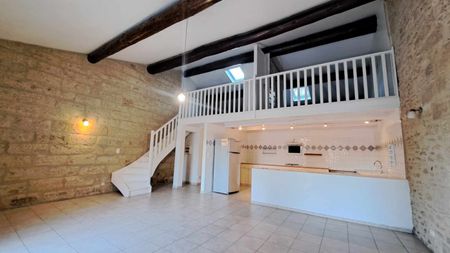 Location - Appartement T2 de 94 m² avec mezzanine, terrasse et emplacement de parking dans garage commun - Photo 3