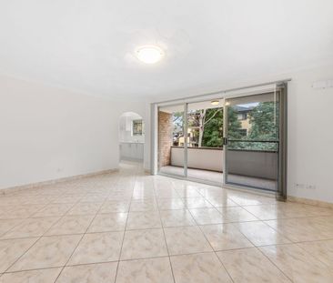 Freshly Updated Air-Conditioned Two-Bedroom Unit with Single Garage! - Photo 1