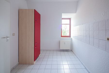 Helle Dachwohnung mit Parkett, EBK und Wanne. - Foto 4