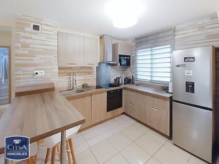 Location Appartement 3 pièces 63m² LA POSSESSION 97419 - Photo 2