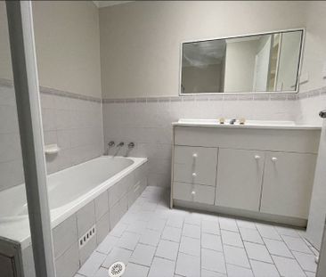 Two Bedroom Unit in Great Location - Photo 1