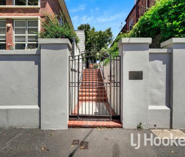 Experience the vibrant city lifestyle in this fully furnished groun... - Photo 3