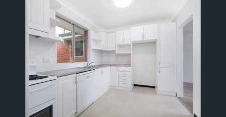 Centrally located with water and district views - Photo 2