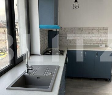 Prima închiriere: Apartament ultrafinisat cu 2 camere, parcare privată, zonă centrală - Fotografie 3