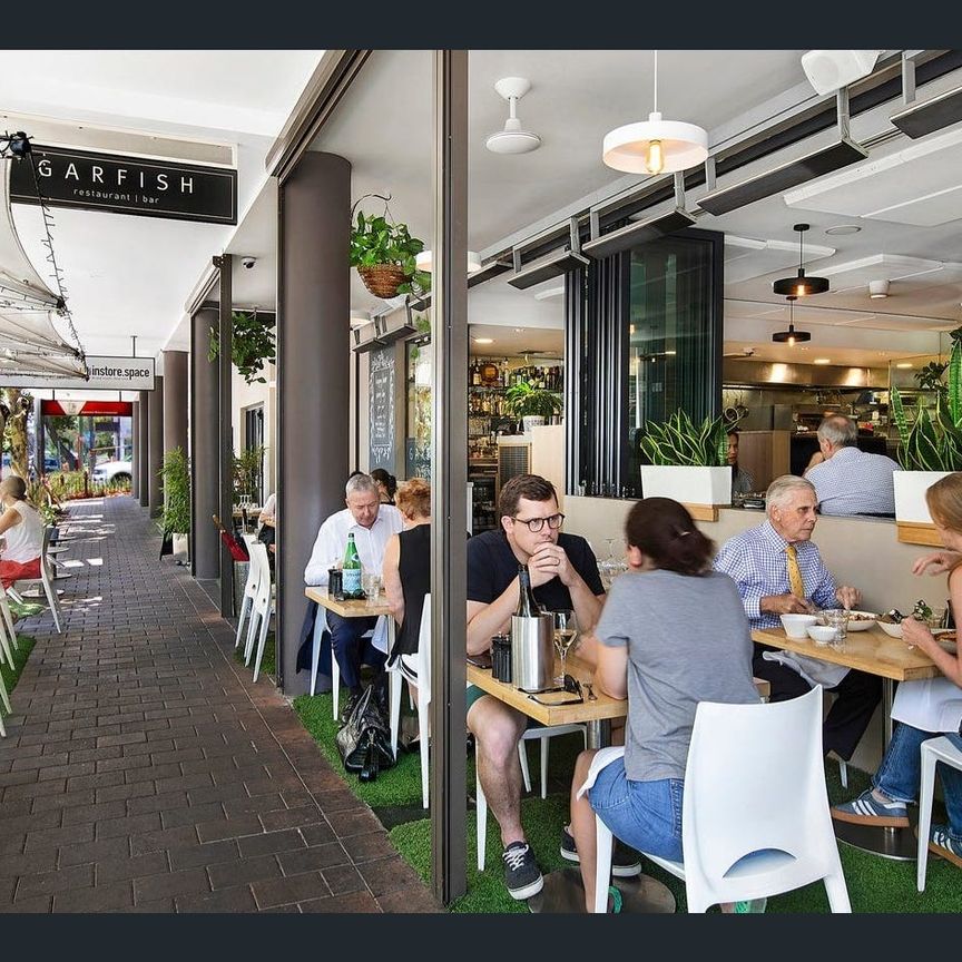 Bright and Spacious Townhouse with Private Courtyard & Double Garage - Photo 1